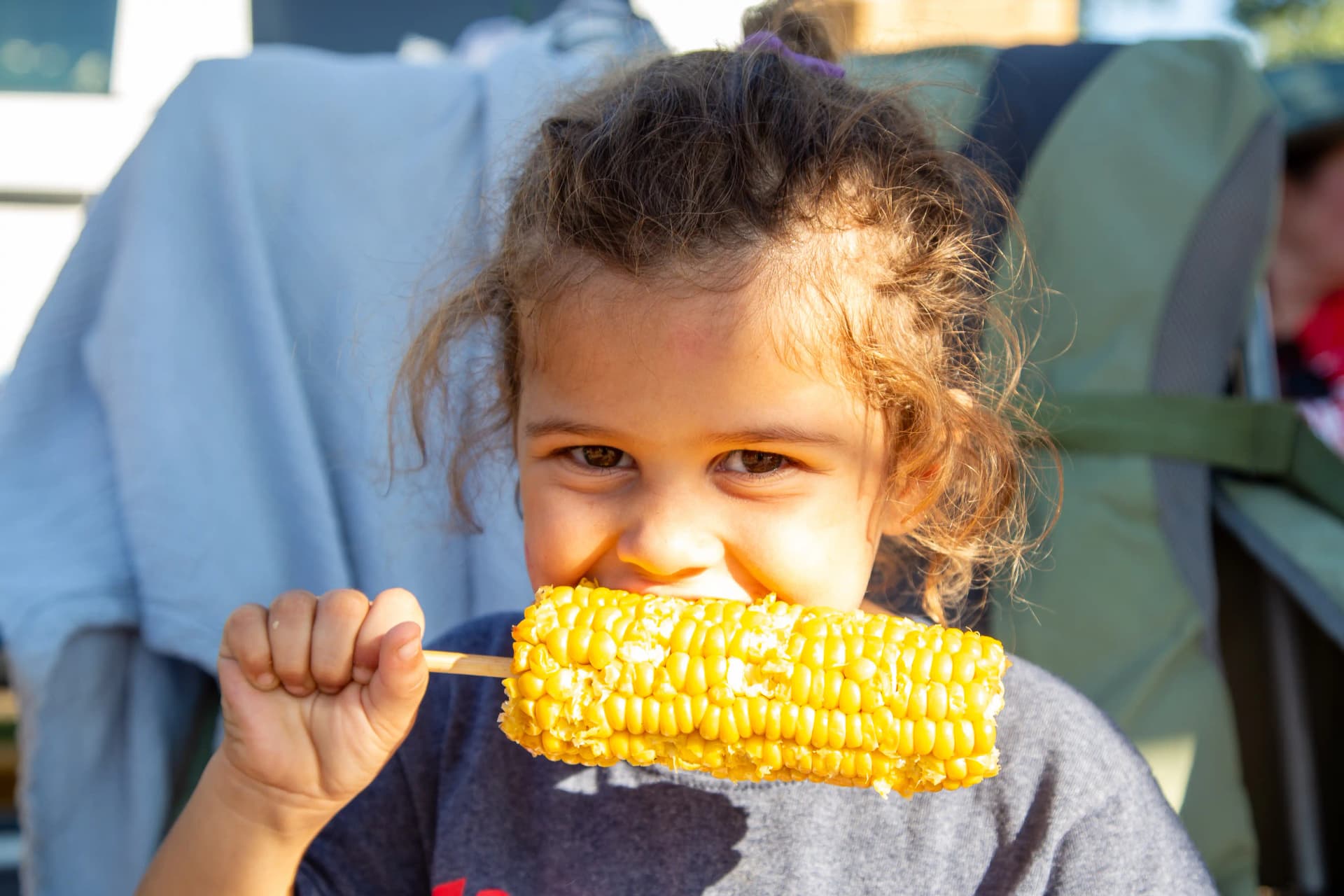A young girl enjoying food at GorretiFest
